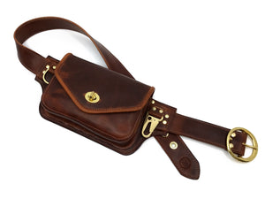 cognac brown leather hip pack with brass hardware